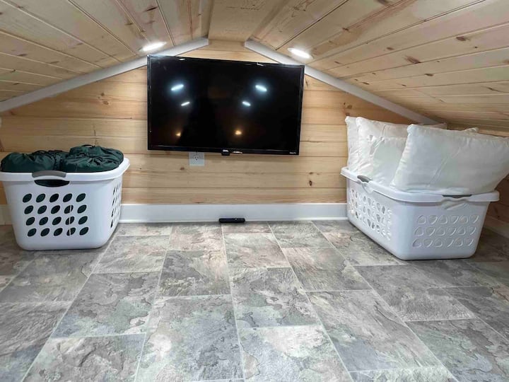 4 pillows and 4 sleeping bag blankets. Please use sheets provided in cabinet under the desk area. 