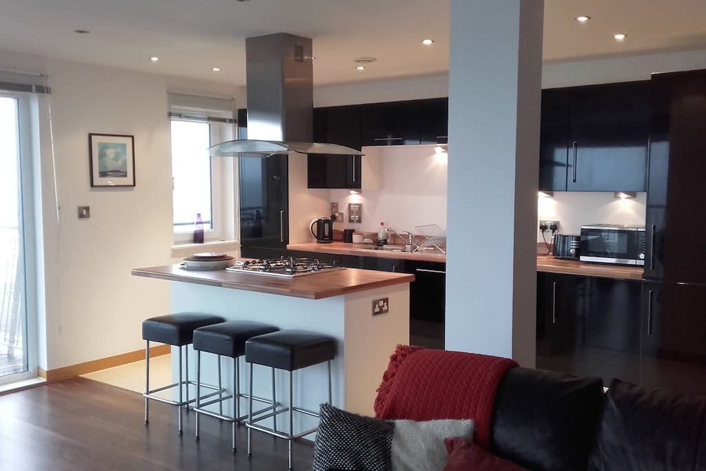 Open plan spacious and well equipped kitchen