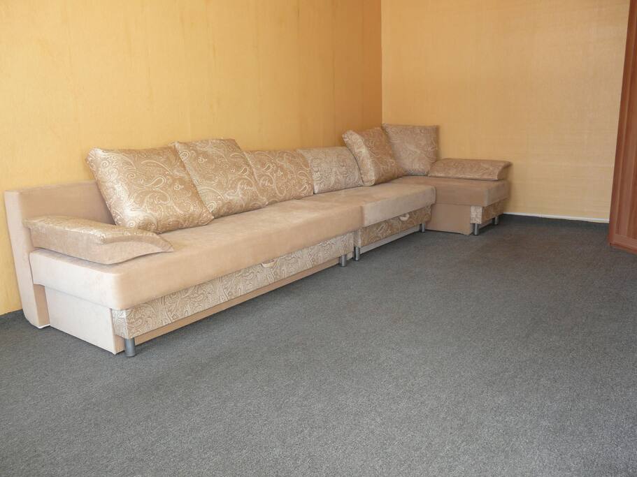 Two separate sofas which both unfold into double bed.
