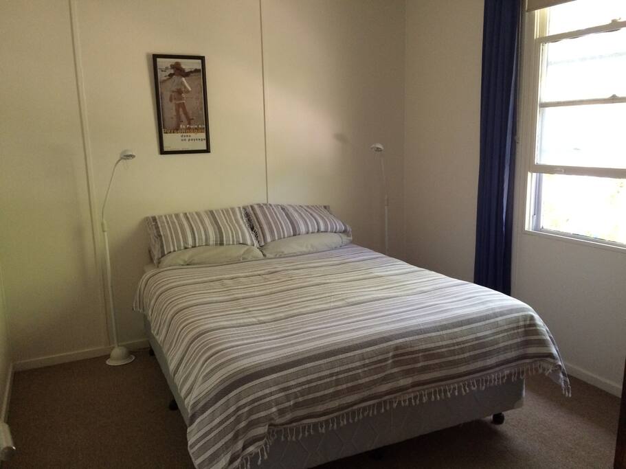 Main Bedroom with Queen size bed and wardrobe storage