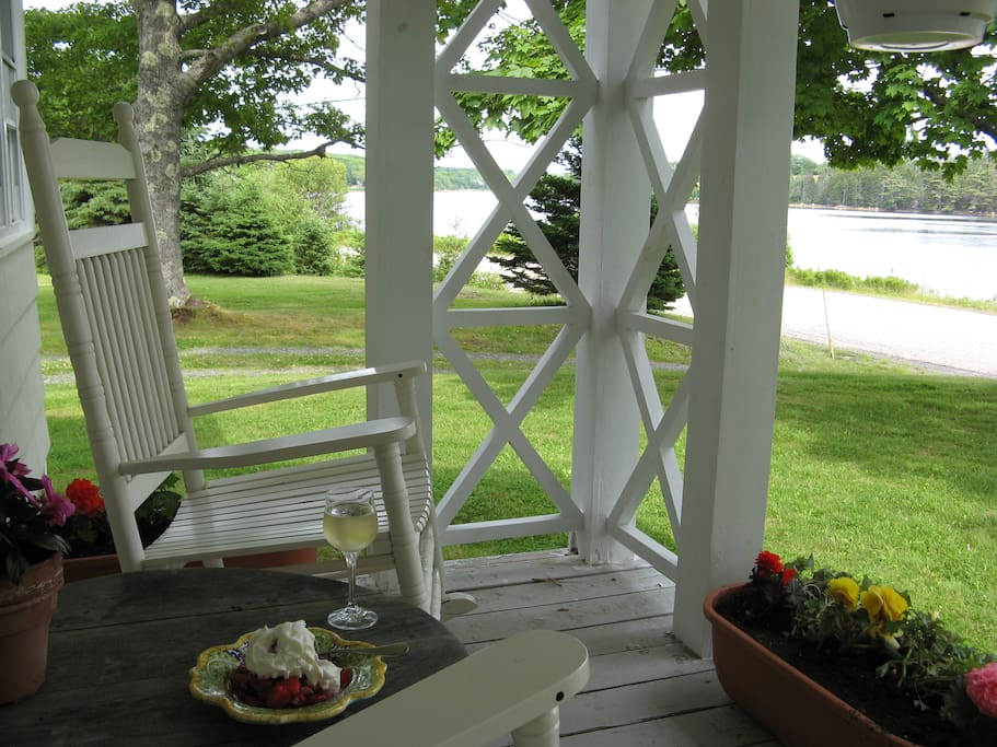 Enjoy the view of the cove from the rockers on the veranda.