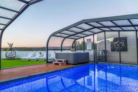 Mansion on the Water- Luxury Villa with Heated Pool & Hot Tub