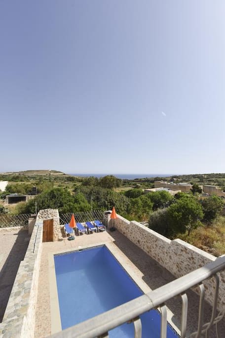Pool area with unobstructed views