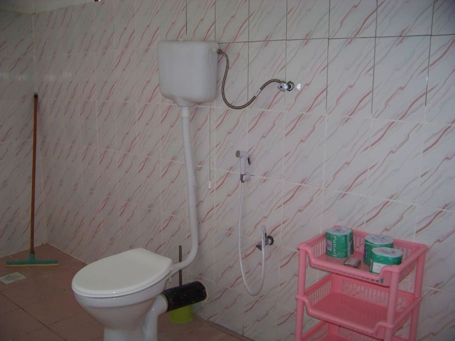 Big airy tiled bathrooms with Western style toilets.