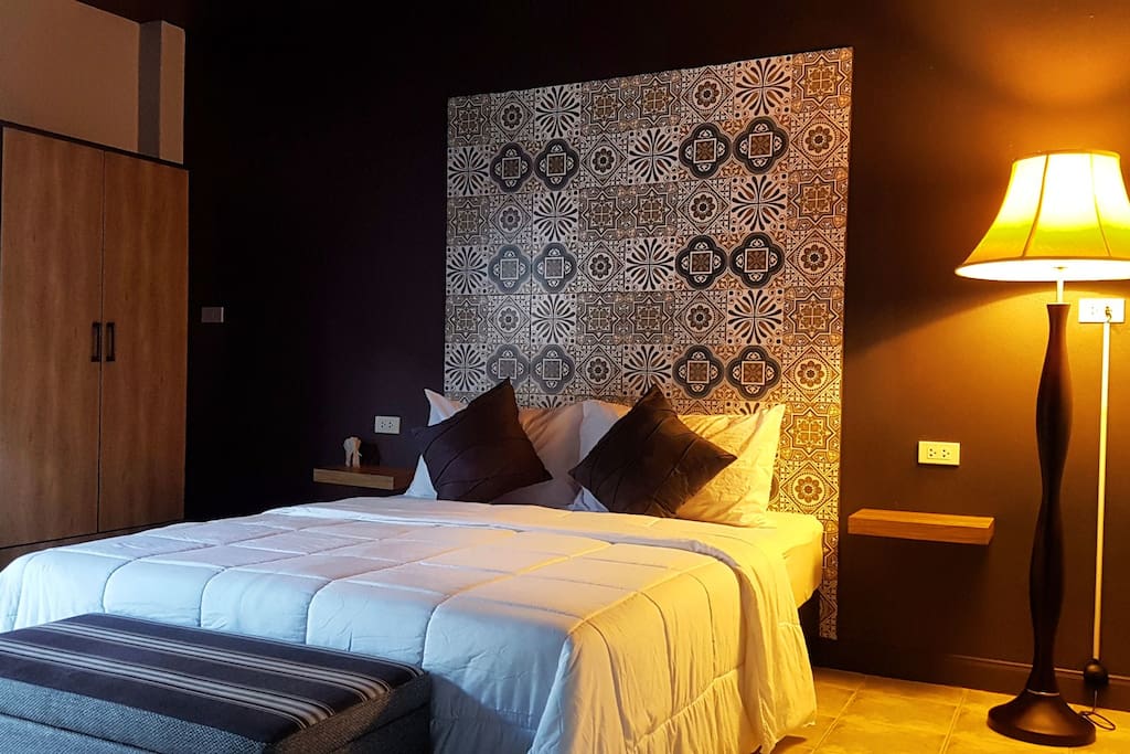 Our rooms are furnished with queen sized beds, designer work desk/chairs, FREE Wi-Fi, large wardrobes, latex bed/pillows for extra comfort, sitting area with views of temple/city/rainforest, safety box, walking distance to beach, umbrella, clothes hangers, laundry bag/service, extra foldout beds available & more greatness for you..