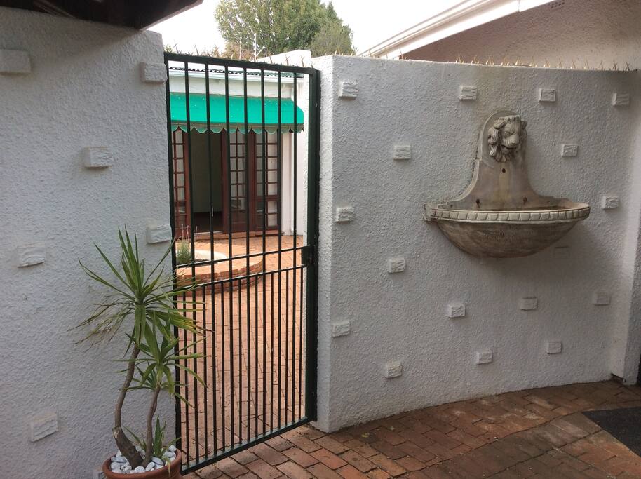 Water feature, court yard entrance and front door