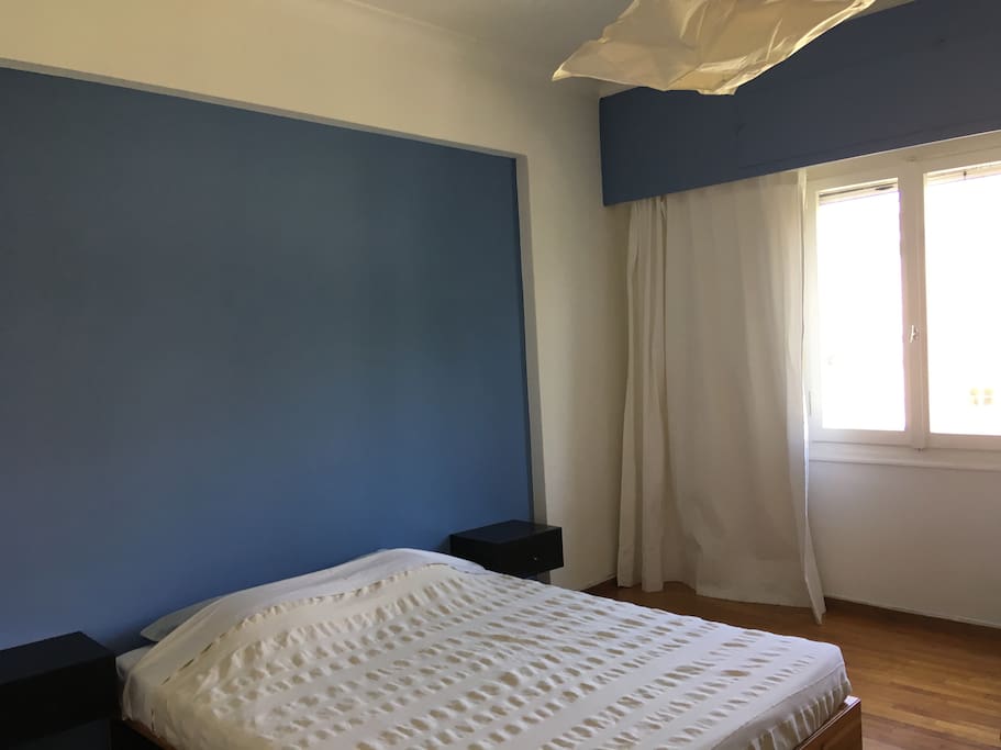 Master bedroom with tempur mattress and full view of the Parthenon