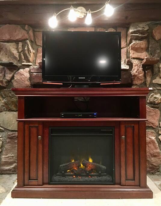 electric fireplace for added comfort and atmosphere