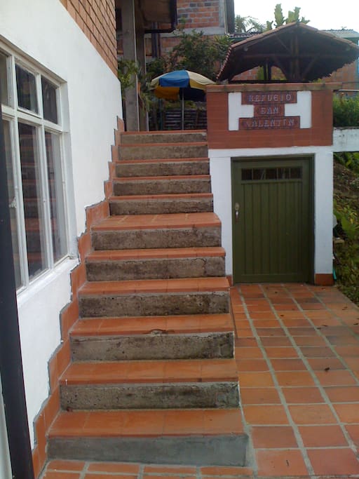Access to the second floor (bedrooms, bathrooms, kitchen, comun areas, BBQ and kiosk