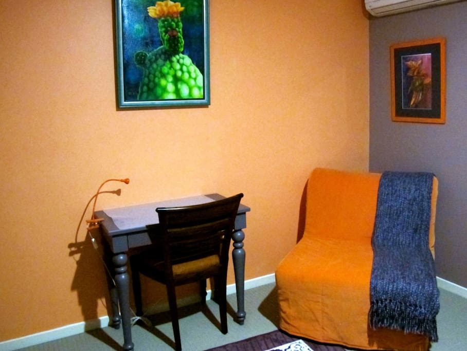 Guest bedroom - second photo. This sofa-chair can accomodate a second person.