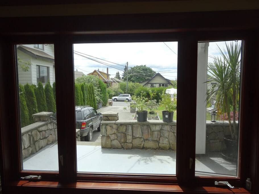 View from Dining Room. House to the left is empty.