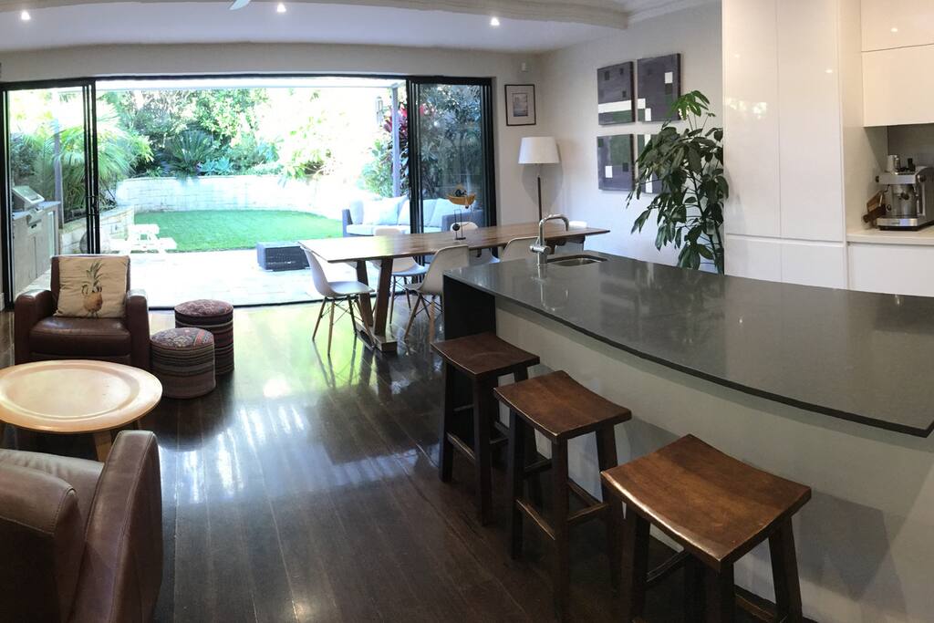 Gourmet kitchen/dining & living area