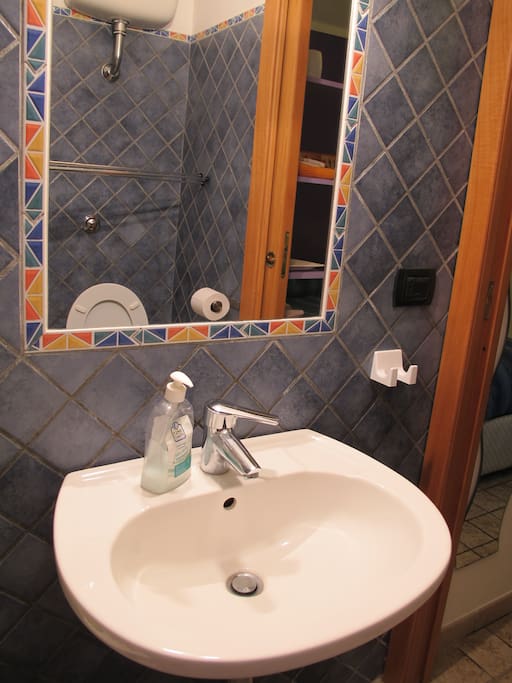 Bathroom. Mirror and sink.