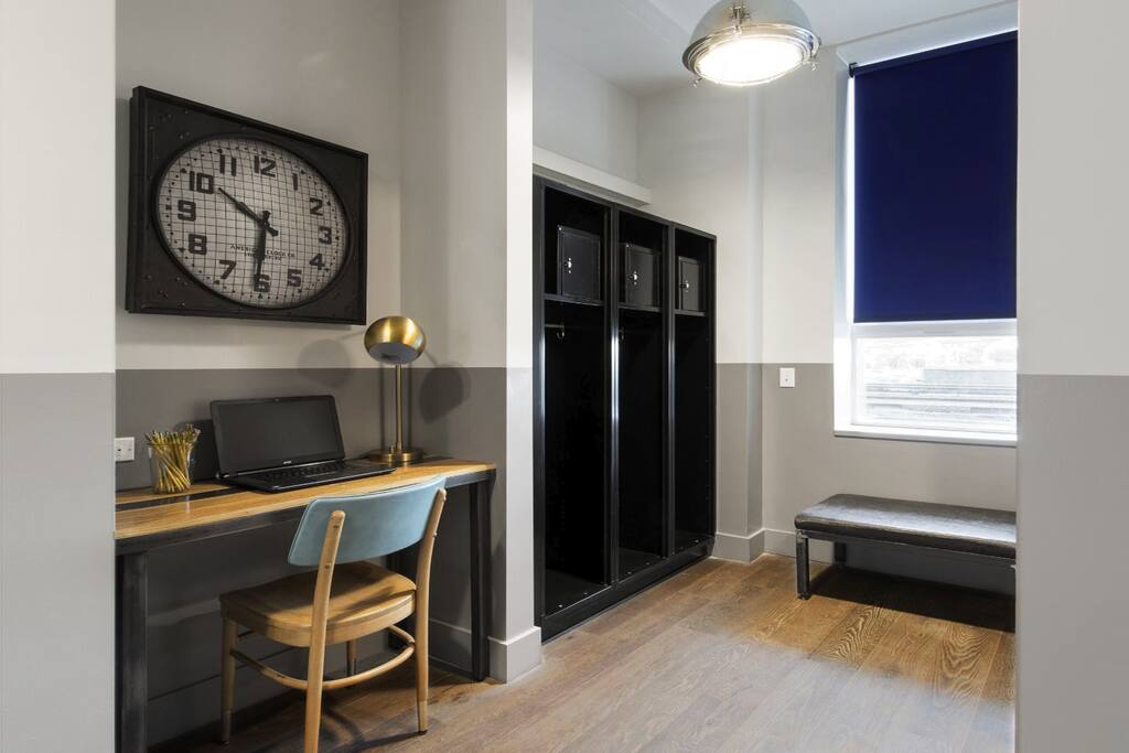 View of desk and lockers.