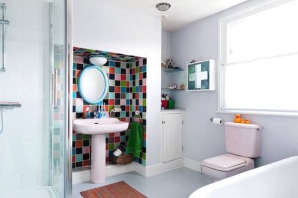 This is our very large shared bathroom, there is a shower and bath available for you to use.