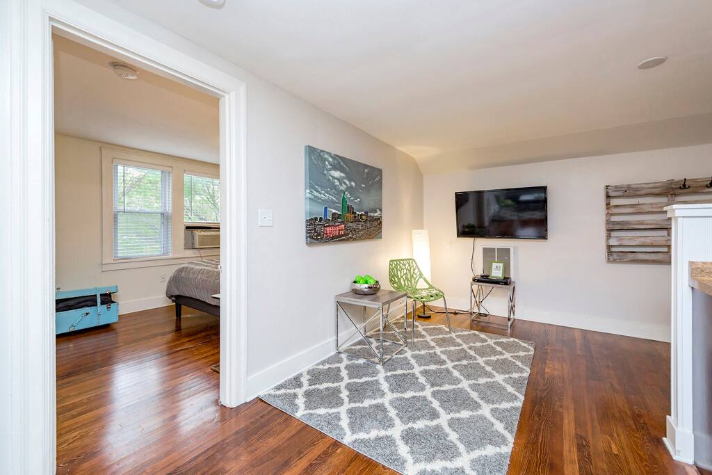 From open concept living area to bedroom