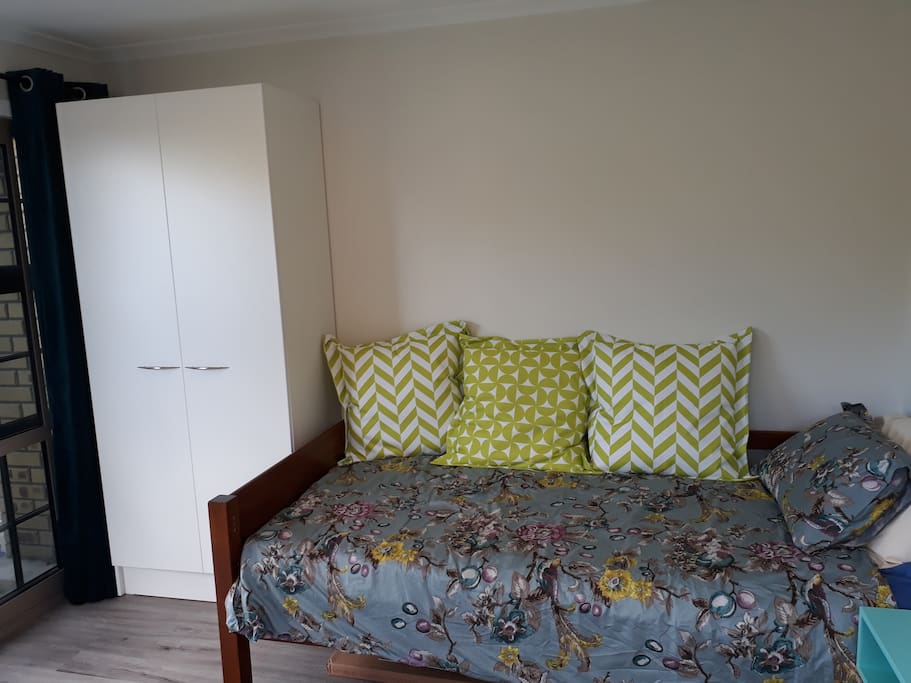 Main bed and wardrobe