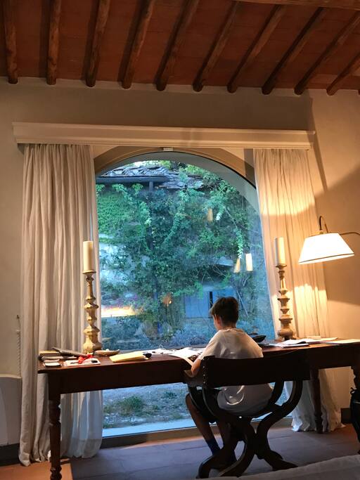 200 year-old antique table with beautiful view to villa across the small, private road. Extremely quaint!
