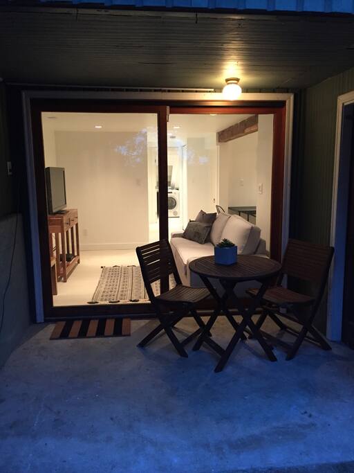 Covered south facing outdoor patio area for two