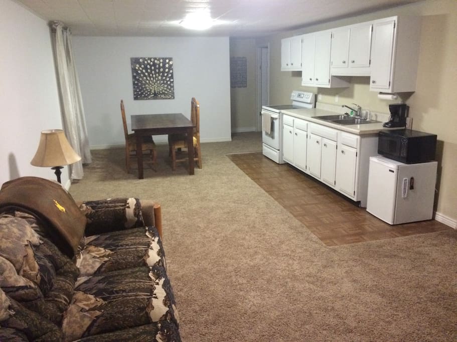 Great room with living, dining, and kitchen.