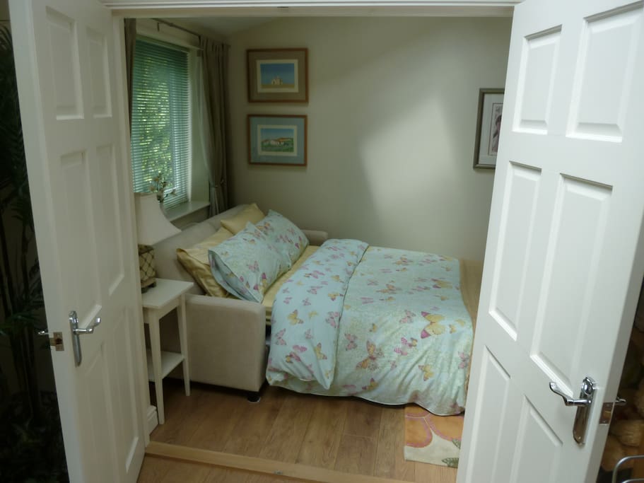 Entrance to guest bedroom from dining kitchen.