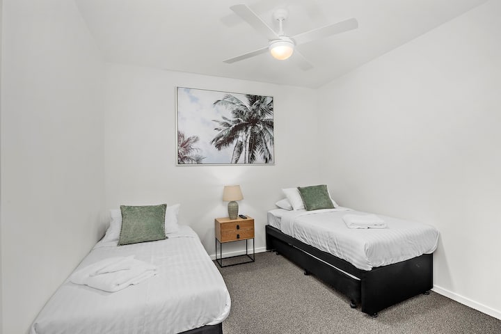 2 x Single Beds with optional Trundle Bed. Wall mount TV with Chromecast.