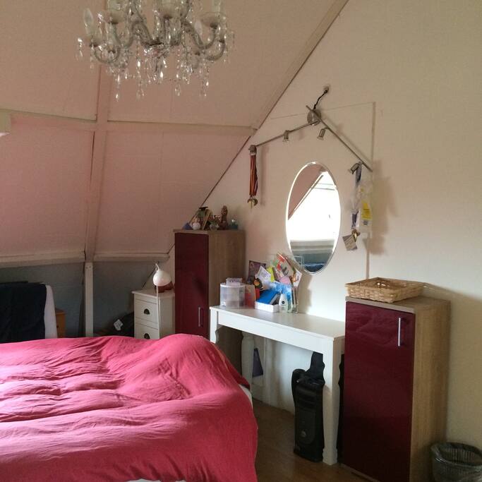 Big round bed for two (box spring); for single guests we offer a single bed!