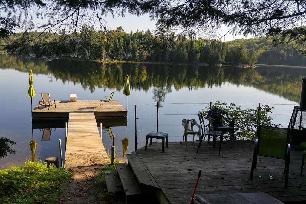 View of the dock and deck from the path down to the lake