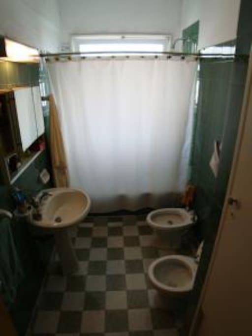 Baño en suite con bañera