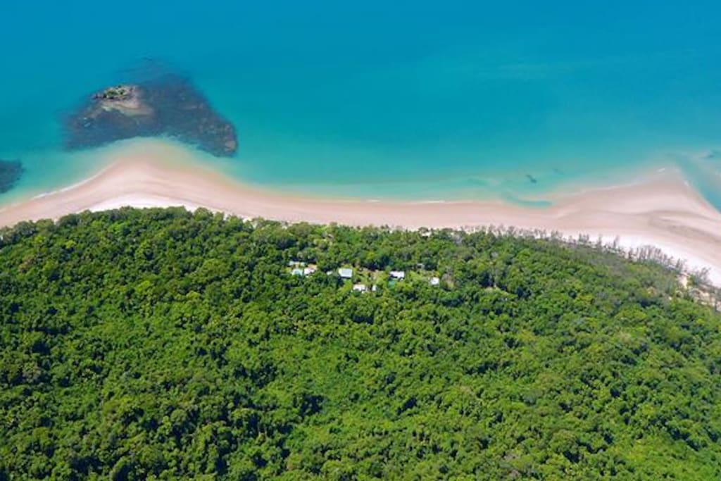 Nestled between rainforest and beach