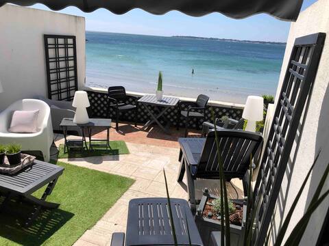 Facing the ocean directly on the beach