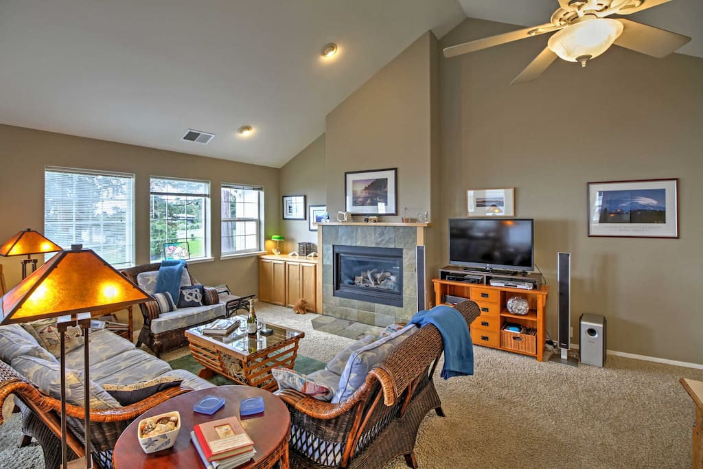 Warm your toes by the gas-burning fireplace as you watch TV on the flat screen DirecTV.