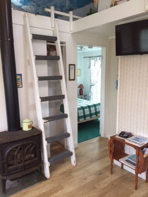Looking from the living room into the back bedroom.