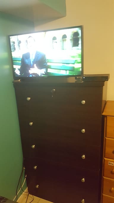 32in TV on dresser in room for rent