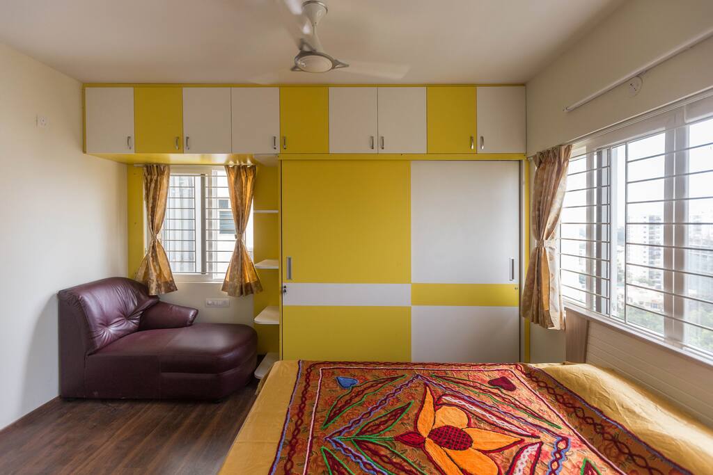 1st Bed Room with Hydraulic Storage Bed / 8” Mattress on the Lower Floor of Duplex Flat with TV, Lounger