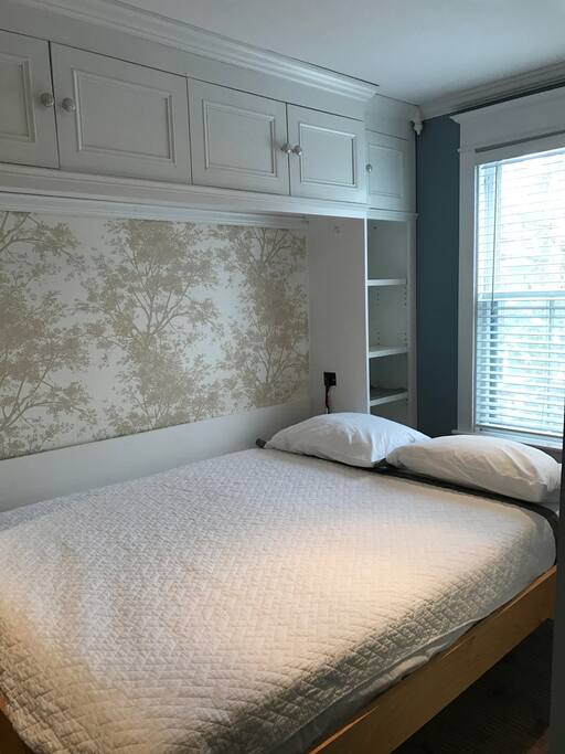 Custom Murphy bed, open. Brand new Caspar mattress, pillows & bedding.