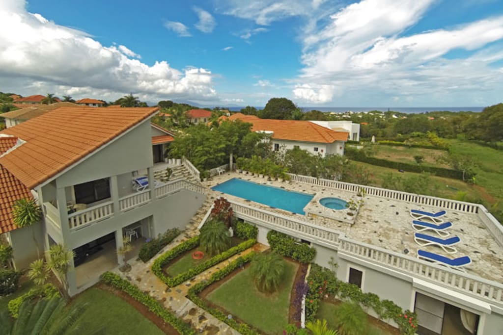 Bird view from back of the villa with large private swimming pool and cold water Jacuzzi