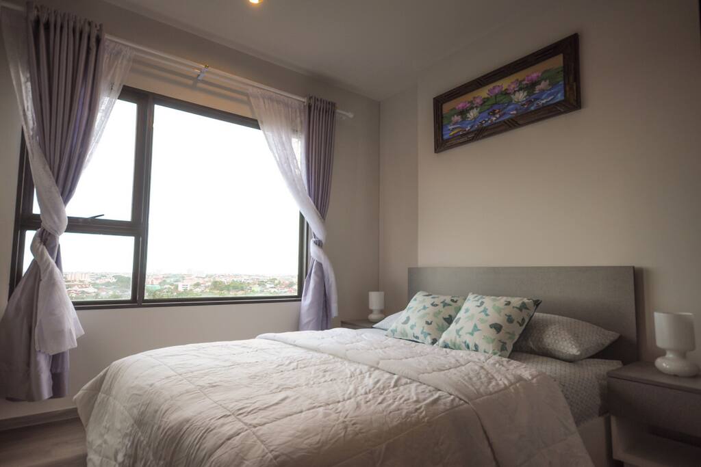 Comfy bedroom with nice breeze.