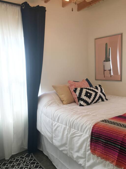 The master bedroom has a queen size bed and blackout curtains so you can sleep in and enjoy your vacation:)