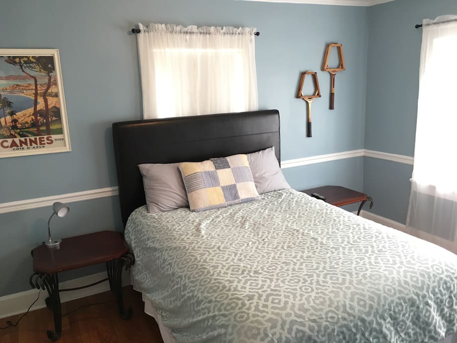 This is the finished room, decorated with a framed poster I actually bought in Cannes in 1997, along with duel nightstands, and a reading lamp