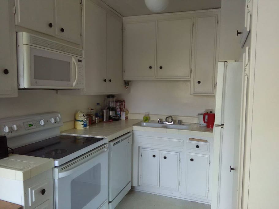 The kitchen with oven, dishwasher and microwave. You are welcome to cook here. :)