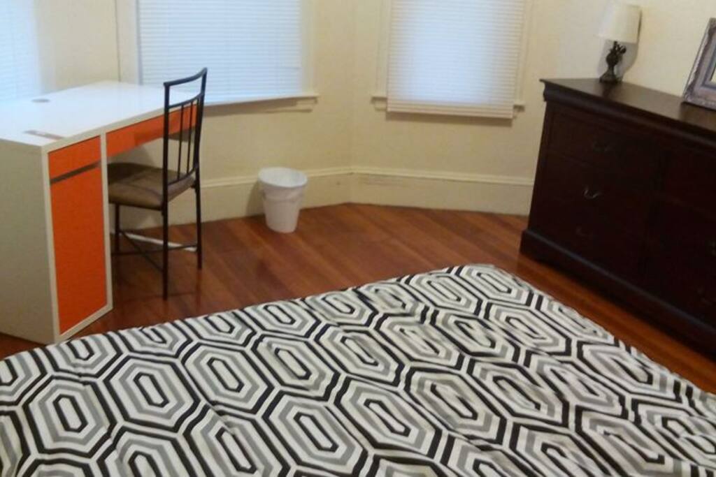 The Guest Room Full Size Bed, Large Dresser, Closet, Lamp, Ceiling light, Desk, 3 Windows.