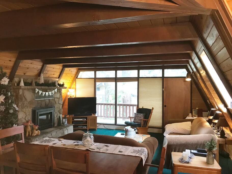 Open floor plan with comfy seating and fireplace