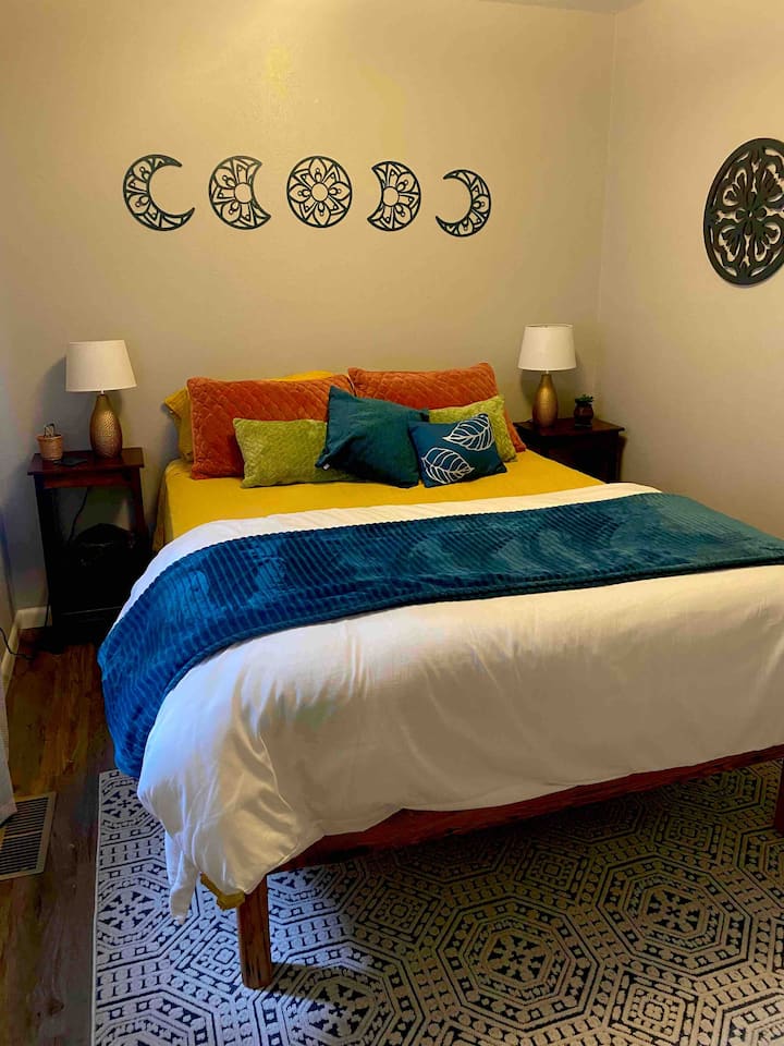 The first bedroom down the hall has a super comfortable queen mattress on a custom bed platform made of reclaimed wood by local artisan virgintimberlumber.com 