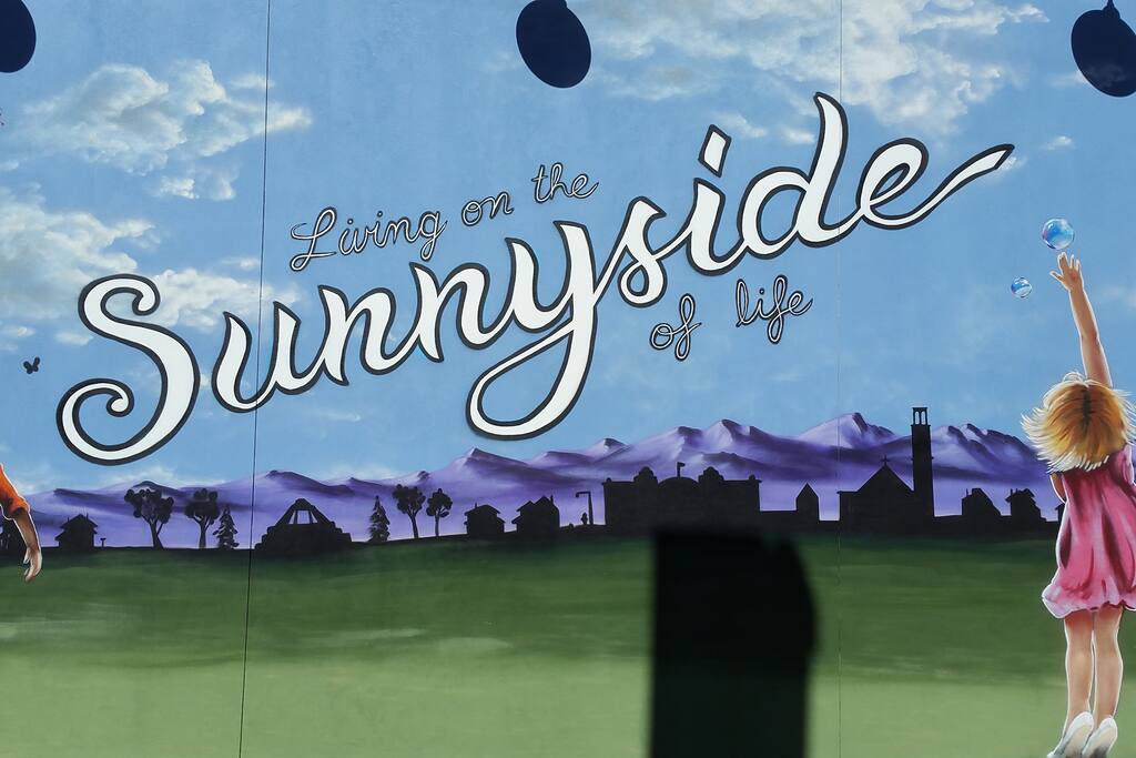 Neighborhood mural near Zuni.