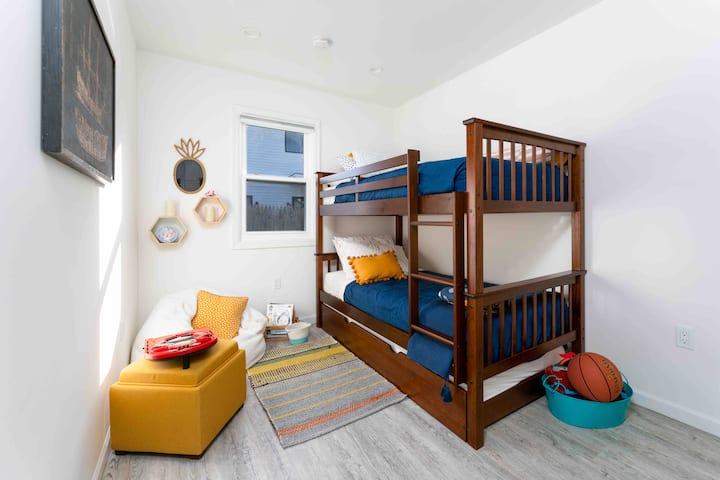 Kids room - 3 twin beds (including trundle). Lots of toys, books. Pack N play can also be provided upon request. 