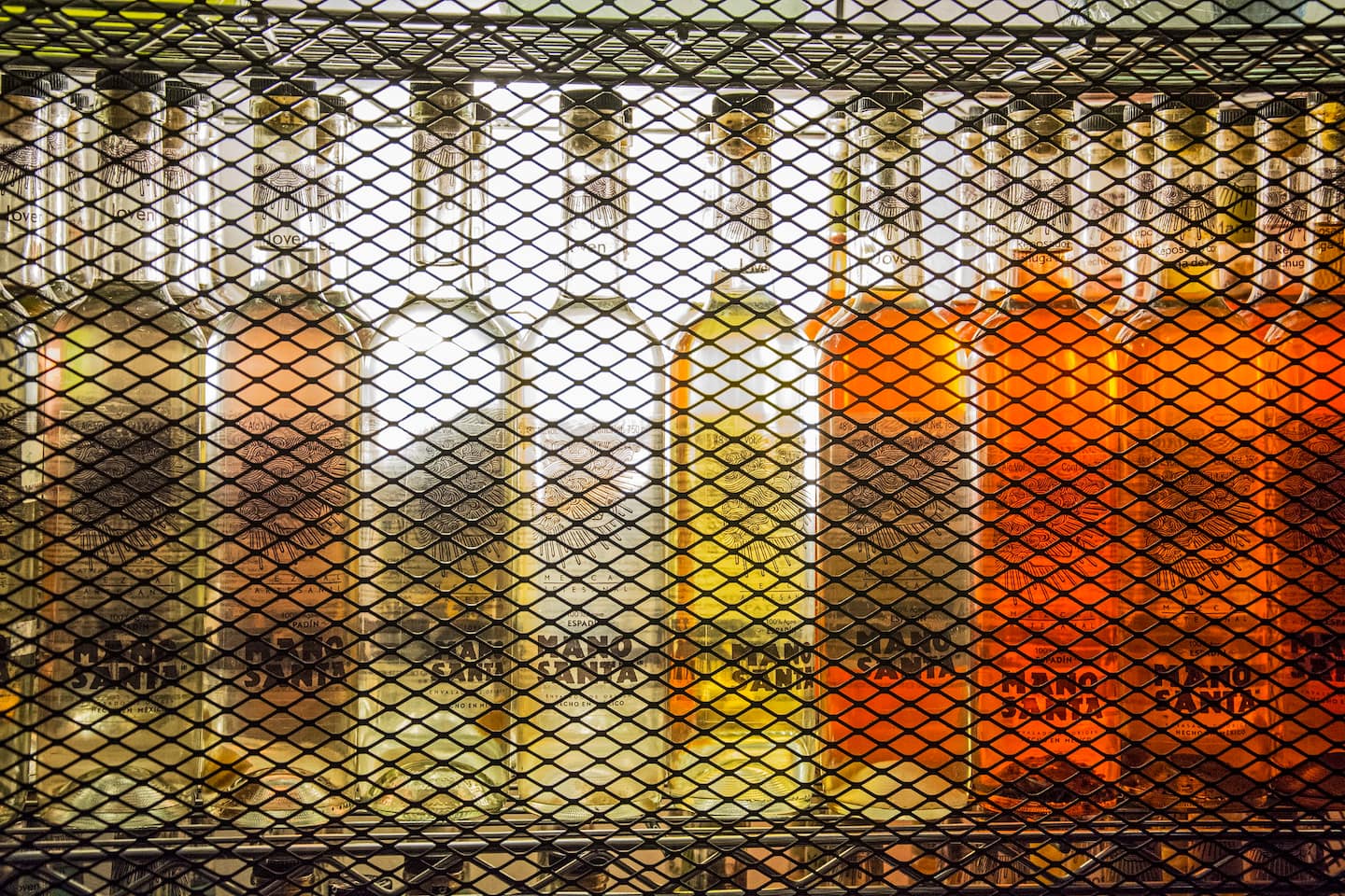 mezcal bottles with different types of mezcal