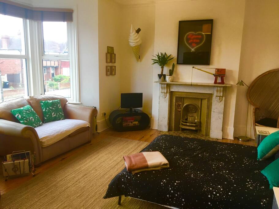 Sofa and ample space. There is a pull out bed of a third person needs to stay.