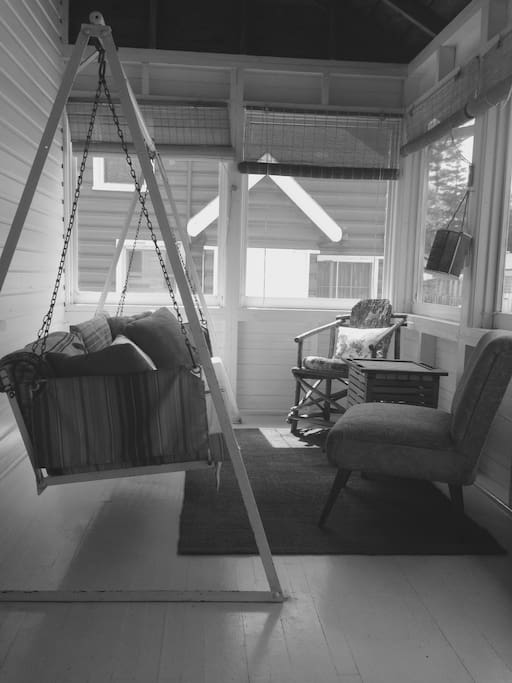 The sun porch where the porch swing is the best place to enjoy your morning coffee.
