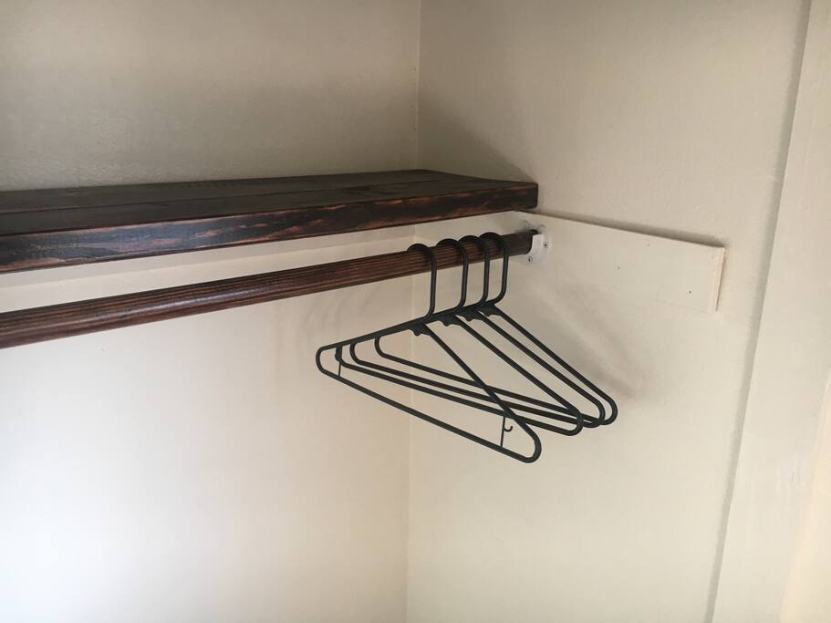 Lots of closet space handmade custom shelving